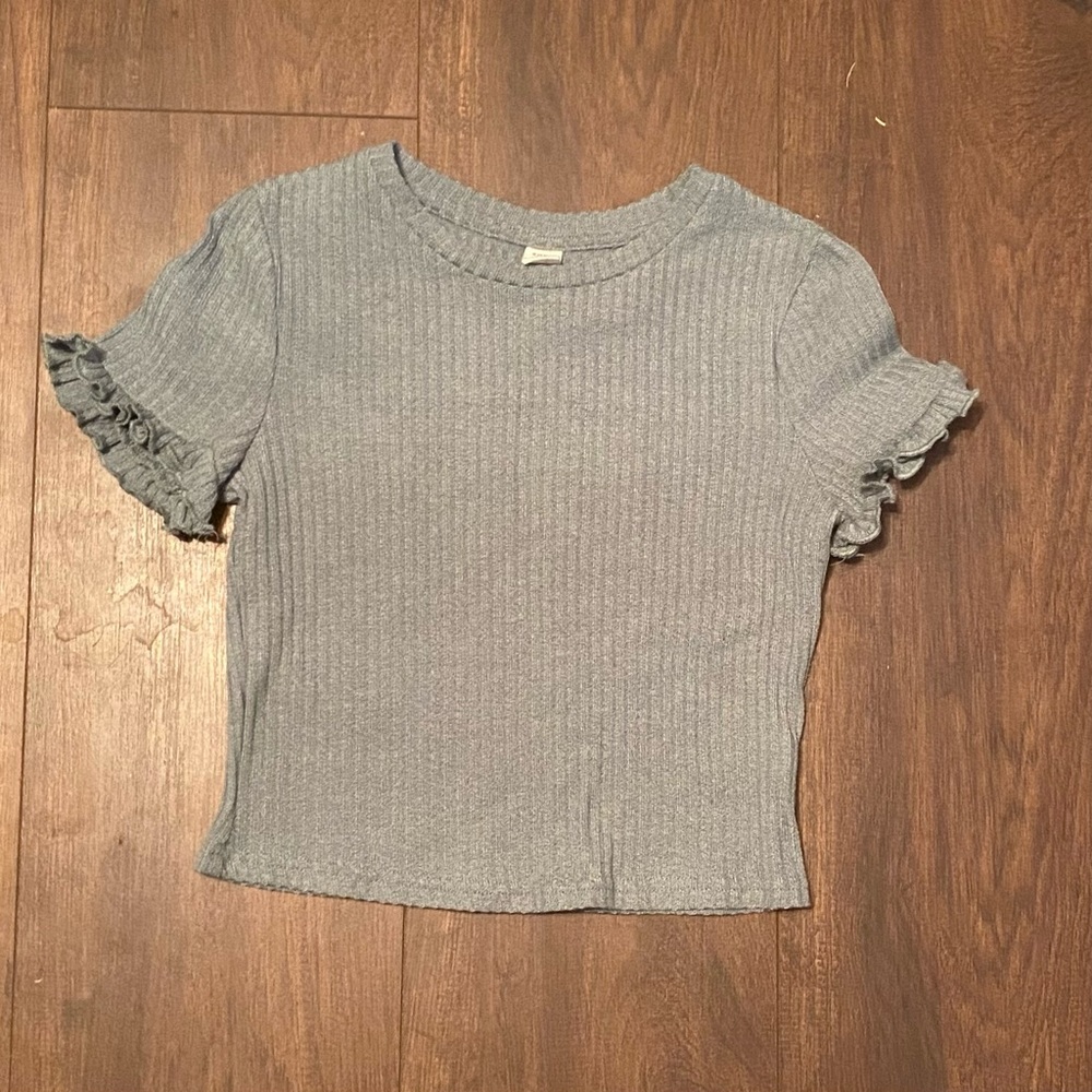 This is from Shien teen! the size is 12-13y! T-shirt and has ruffels!